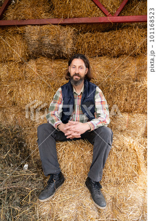 Farmer in the hayloft. Farmer in the hayloft. 101168523
