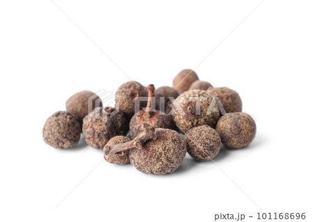 Spicy black pepper grains isolated on white 101168696