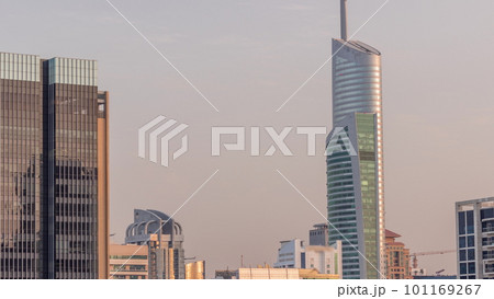 Dubai Marina Skyline with JLT district skyscrapers on a background aerial timelapse. Dubai Marina Skyline with JLT district skyscrapers on a background aerial timelapse. 101169267
