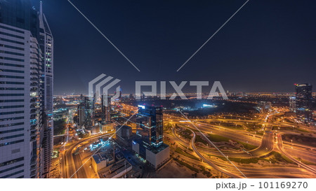 Aerial view of media city and al barsha heights district area all night timelapse from Dubai marina. 101169270