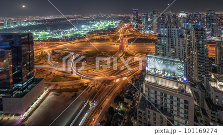 Panorama showing Dubai marina and JLT skyscrapers along Sheikh Zayed Road aerial night timelapse. Panorama showing Dubai marina and JLT skyscrapers along Sheikh Zayed Road aerial night timelapse. 101169274