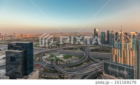 Panorama showing Dubai marina and JLT skyscrapers along Sheikh Zayed Road aerial timelapse. Panorama showing Dubai marina and JLT skyscrapers along Sheikh Zayed Road aerial timelapse. 101169276