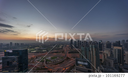 Huge highway crossroad junction between JLT district and Dubai Marina night to day timelapse. Huge highway crossroad junction between JLT district and Dubai Marina night to day timelapse. 101169277