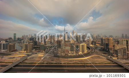 Panoramic skyline of Dubai with business bay and downtown district morning timelapse. 101169301