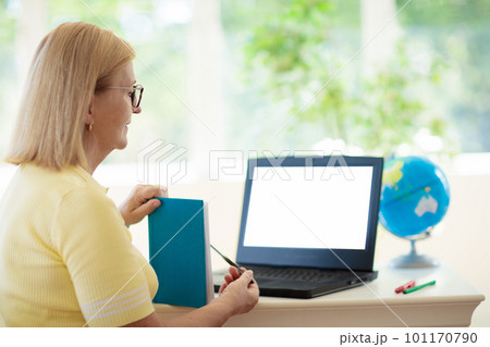 Online remote learning. Teacher with computer. 101170790