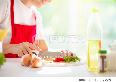 Woman cooking dinner. Cook spaghetti 101170791