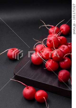 Delicious fresh raw red radish for making healthy salad Delicious fresh raw red radish for making healthy salad 101171327