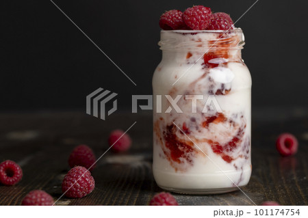 Fresh milk yogurt with whole fresh raspberries 101174754