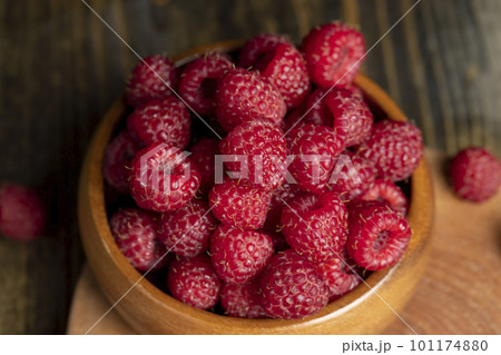 Harvested red ripe raspberries in the kitchen Harvested red ripe raspberries in the kitchen 101174880