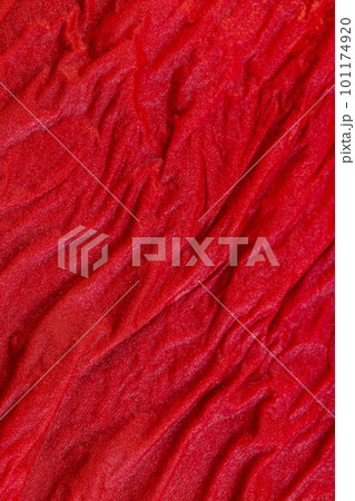 Wet red napkin on the table, close-up 101174920