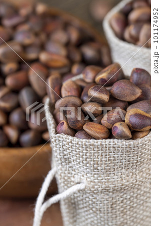 a bunch of pine nuts in the shell a bunch of pine nuts in the shell 101174952