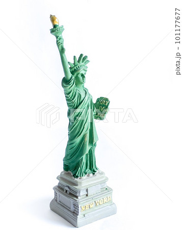 Small Liberty Statue souvenir on white background, a landmark of New York city 101177677