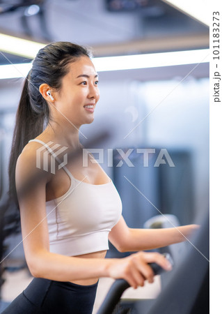 woman training at the gym, training,muscle woman training at the gym, training,muscle 101183273