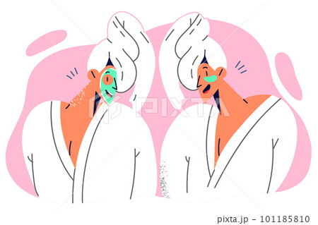 Women are standing in bathrobes and towels for spa procedures and cosmetic masks for face and eyes 101185810
