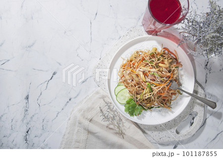 Vegetarian salad. Salad with funchose and vegetables. Vegetarian salad. Salad with funchose and vegetables. 101187855