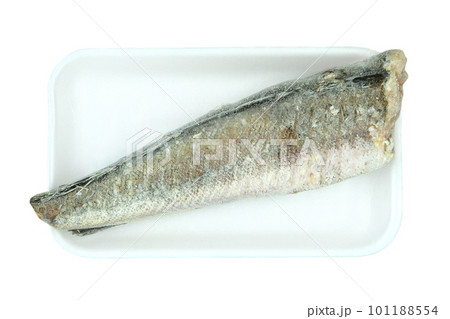 Fish frozen fillet hake on a plate isolated on white background. Top view. Fish frozen fillet hake on a plate isolated on white background. Top view. 101188554