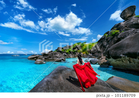 Beautiful girl standing on the rock at Similan island, Thailand. Beautiful girl standing on the rock at Similan island, Thailand. 101189709