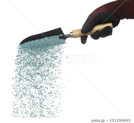 Fertilizer blue chemical accelerate growth fly fall from shovel, many tiny ball fertilizer for planting float throw in mid air. White background isolated high speed freeze motion Fertilizer blue chemical accelerate growth fly fall from shovel, many tiny ball fertilizer for planting float throw in mid air. White background isolated high speed freeze motion 101190605