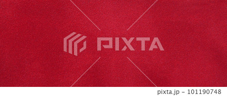 Texture of dark red velvet matte background, macro. Suede ruby fabric with pattern. Seamless wine textile 101190748