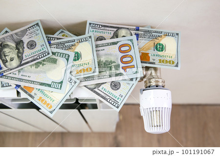 Radiator and money. The concept of payment for heating. 101191067