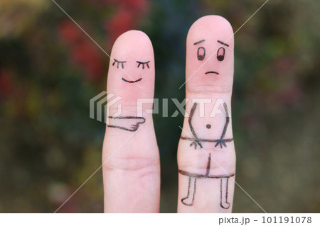 Fingers art of the wife laughs at her husband. Concept of impotence. Divorce. 101191078