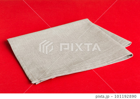 top view with gray kitchen napkin isolated on table background. Folded cloth for mockup with copy space, Flat lay. Minimal style 101192890