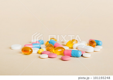 Many different colorful medication and pills perspective view. Set of many pills on colored background 101193248