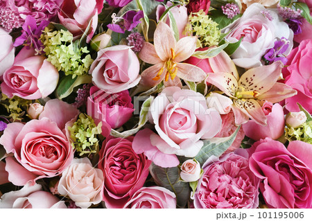 Delicate blooming festive roses and pink summer flowers, blossoming rose flower soft pastel background, bouquet floral card Delicate blooming festive roses and pink summer flowers, blossoming rose flower soft pastel background, bouquet floral card 101195006