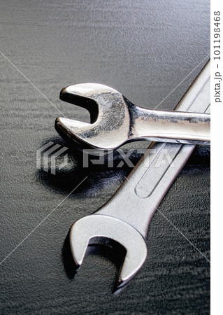 Two wrenches on a wooden table copy space Two wrenches on a wooden table copy space 101198468