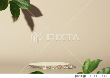 Wood slice podium on beige background for cosmetic product mockup 101199349