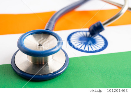Stethoscope on India flag background, Business and finance concept. Stethoscope on India flag background, Business and finance concept. 101201468