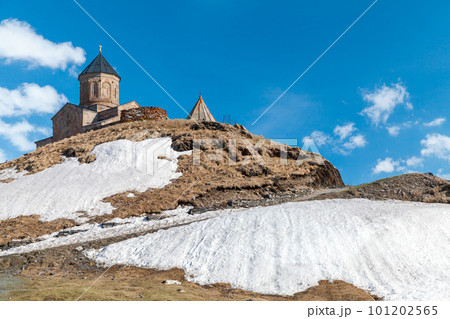 Landscape with Gergeti Trinity Church or Holy Trinity Church, Georgia 101202565