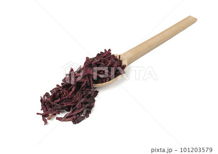 Dried beetroot slices on wooden spoon isolated on white background. 101203579