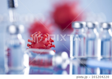 Close up medical syringe with a vaccine 101204220