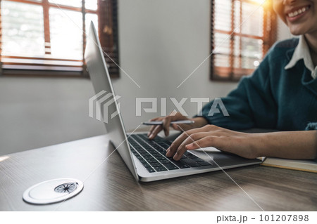 Female hands working on a laptop, close up. Technology, Freelance, online course, remote work, internet concept Female hands working on a laptop, close up. Technology, Freelance, online course, remote work, internet concept 101207898