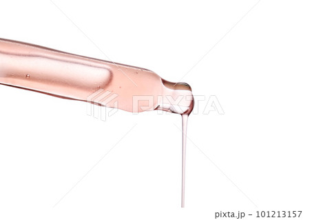 Pipette with a viscous pink cosmetic close-up. Pipette with a viscous pink cosmetic close-up. 101213157
