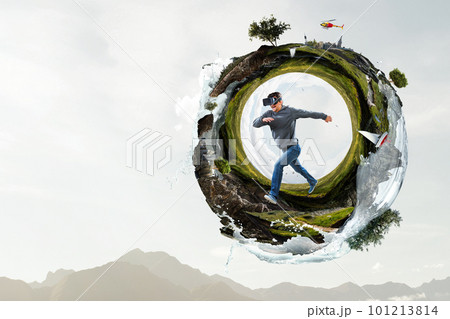Man wearing virtual reality goggles Man wearing virtual reality goggles 101213814