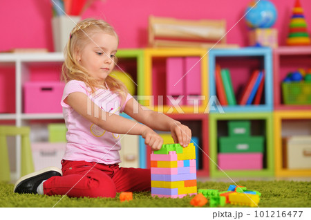 happy cute little girl playing with cubes happy cute little girl playing with cubes 101216477