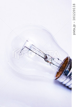 Old light bulb on a gray background Old light bulb on a gray background 101220118