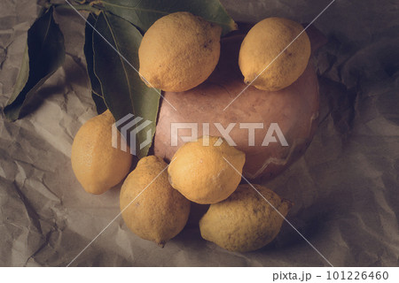 Organic lemons, harvested from the garden, prepared on the table. 101226460
