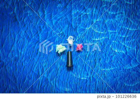 Mouthpiece for shisha om the blue backround. Plastic waste concept. Plastic trash garbage, save nature. Parts of hookah, tobacco Hookah Shisha Mouthpiece on blue background. 101226636
