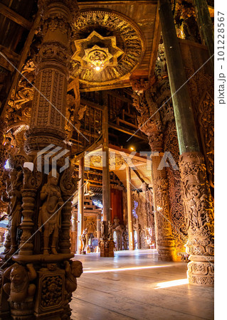 Wooden carving sculptures inside of the Sanctuary of Truth temple in Pattaya, Thailand 101228567