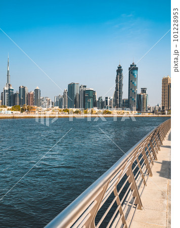 Dubai Water Canal Tolerance Bridge, pedestrian bridge with water taxi, in Dubai, UAE 101228953