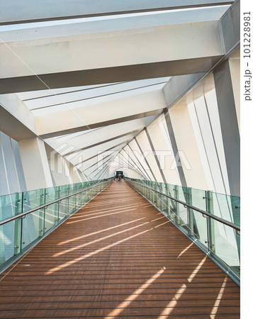 Dubai Water Canal Helix Bridge, pedestrian bridge with water taxi, in Dubai, UAE 101228981