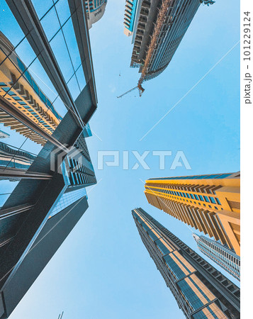 Below Skyscrapers view in Downtown Dubai, business and finance district, UAE Below Skyscrapers view in Downtown Dubai, business and finance district, UAE 101229124