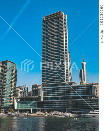 Dubai Marina, harbour, cruise boat and canal promenade view at sunset, in Dubai, United Arab 101230160