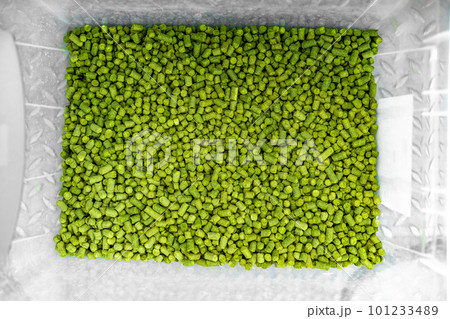 hops in green colored granules for the production of beer in a brewery hops in green colored granules for the production of beer in a brewery 101233489