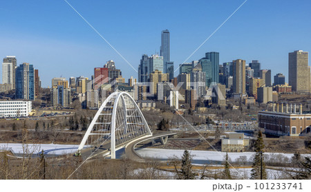 Edmonton, Alberta. Mar 30, 2023. Skyline of Downtown Edmonton with the Walterdale Bridge in the view in the morning with blue sky during winter. 101233741
