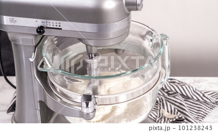 Step by step. Mixing ingredients in kitchen mixer to bake homemade brioche buns. Step by step. Mixing ingredients in kitchen mixer to bake homemade brioche buns. 101238243