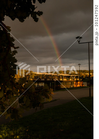Heavy rain and rainbow above the Vistula river in Krakow Poland. Stunning views of the city rainy season and rainbow Heavy rain and rainbow above the Vistula river in Krakow Poland. Stunning views of the city rainy season and rainbow 101247592